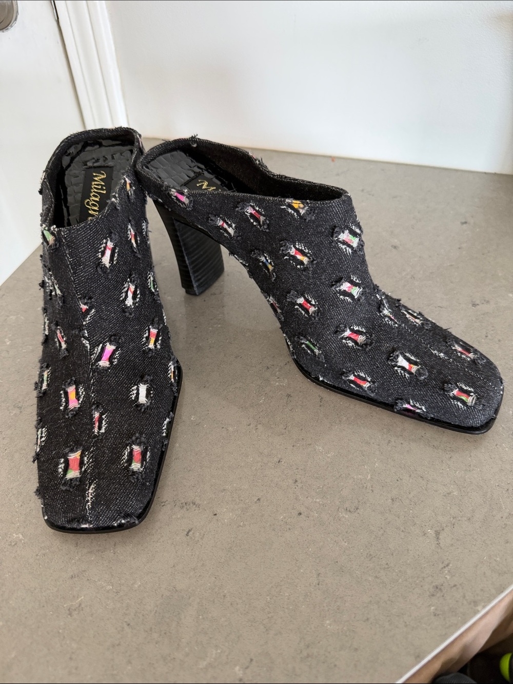 Milagros Denim black mules with leather soles